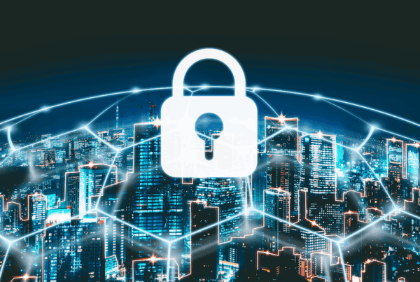 Cyber-Liability-Insurance-is-Critical-to-Municipalities-and-Law-Firms-Graphic-image-of-city-buildings-with-white-lock